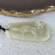 Type A Light Brownish Yellow Jadeite Guan Yin with Lotus Flower and Double Dragon Heads Pendent 24.38g 57.7 by 30.7 by 6.8 mm - Huangs Jadeite and Jewelry Pte Ltd