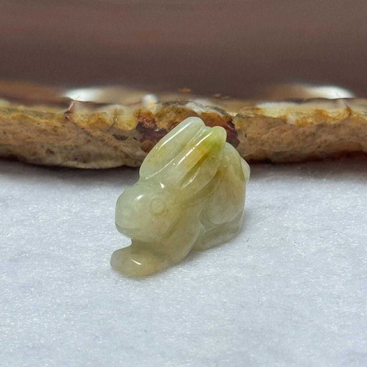 Type A Green and Brown Jadeite Rabbit Pendant 4.52g 22.0 by 7.6 by 16.0mm - Huangs Jadeite and Jewelry Pte Ltd