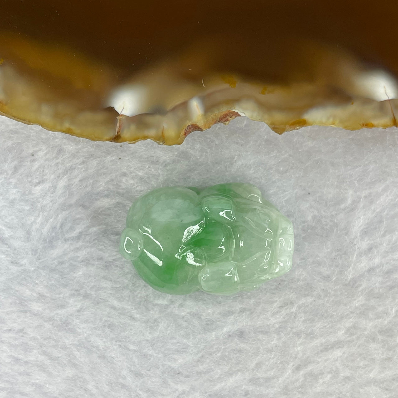 Type A Bright Green with Faint Lavender Jadeite Pixiu Pendent A货辣绿和浅紫罗兰翡翠貔貅吊坠 8.85g 23.0 by 14.8 by 12.1 mm - Huangs Jadeite and Jewelry Pte Ltd