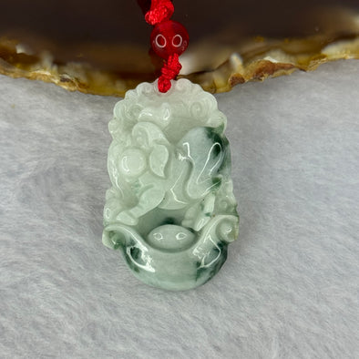 Type A Light Green with Blueish Green Piao Hua Jadeite Pig Pendent 10.33g 33.7 by 22.0 by 6.5mm