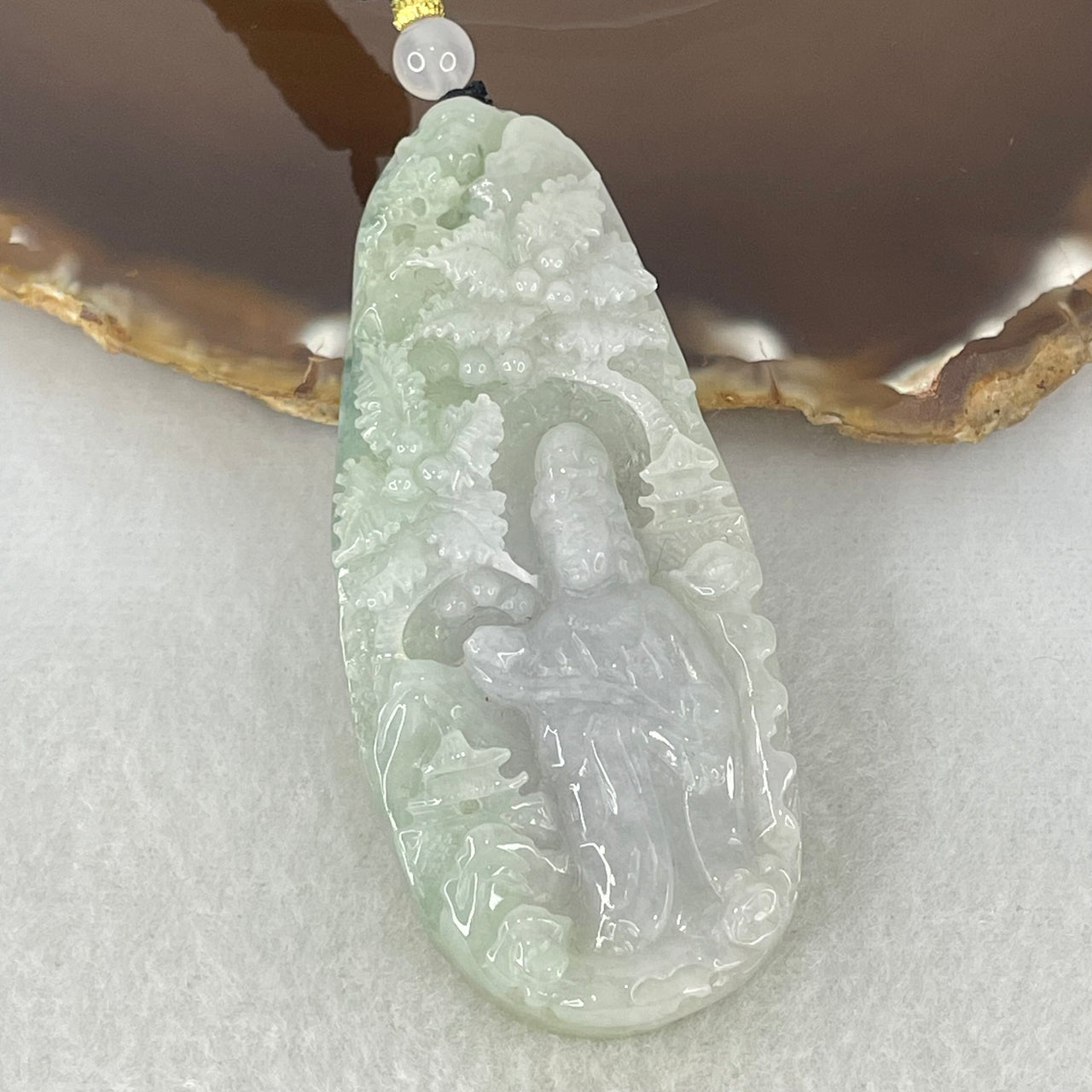 Type A Light Lavender Green Jadeite Shan Shui with Guan Yin Pendant 54.92g 70.9 by 30.6 by 13.2mm