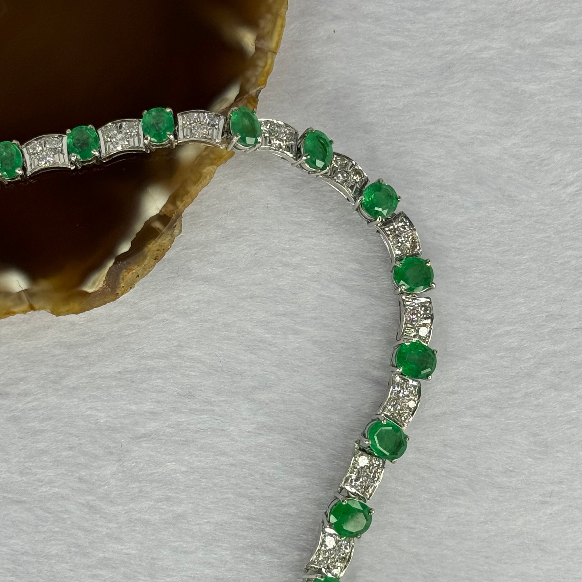 Natural Emeralds (Beryl) 25.0 cts. Total 42.34g including 31 Emeralds, 121 Natural Diamonds in 8k White Gold with NGI Cert No. 82835786 - Huangs Jadeite and Jewelry Pte Ltd