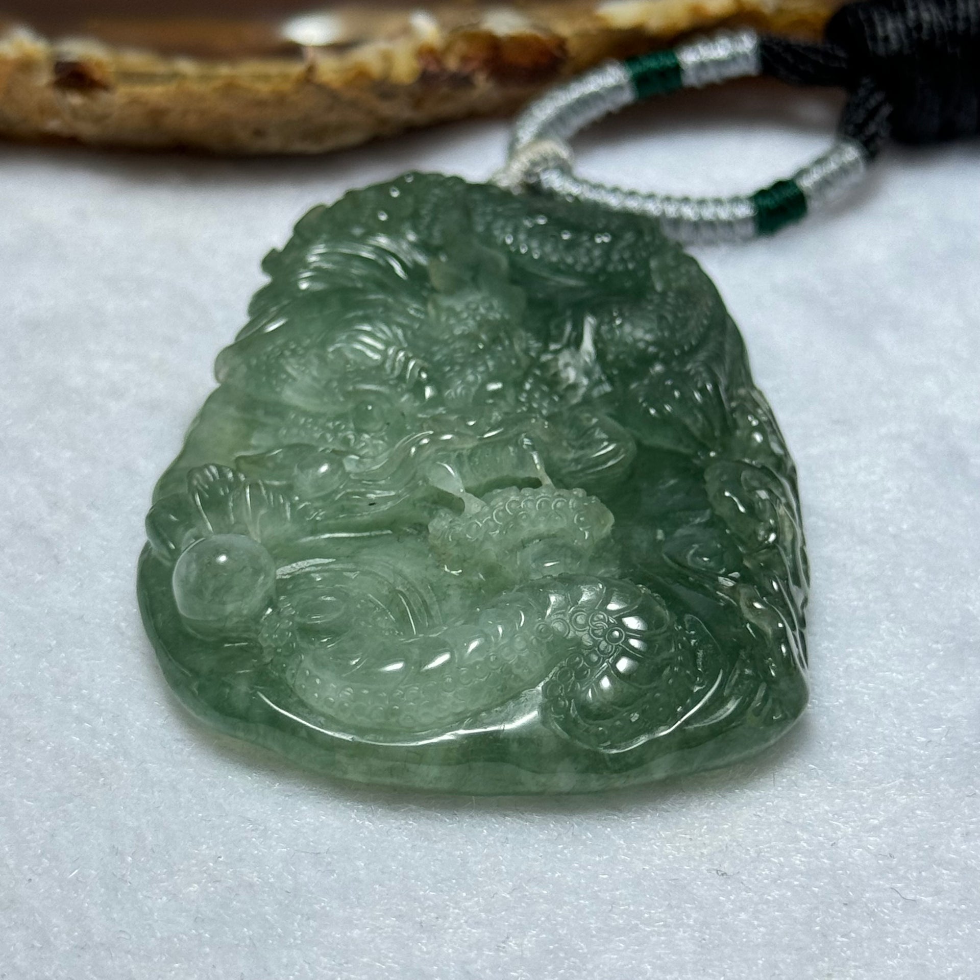 Type A Semi Icy Intense Green Jadeite Dragon Pendent 57.55g 63.1 by 44.4 by 11.3mm - Huangs Jadeite and Jewelry Pte Ltd