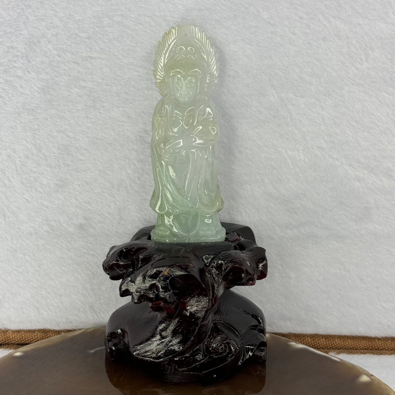 Type A Light Green Lavender Jadeite Small Guan Yin Display with Wooden Stand 188.85g 120.8 by 66.2 by 58.2mm - Huangs Jadeite and Jewelry Pte Ltd