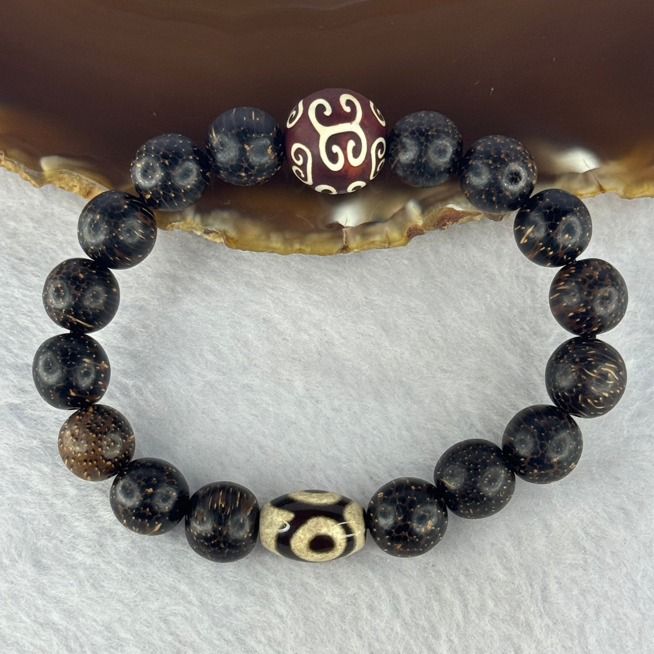 Natural Agarwood With 3 Eyes Dzi Bead Tian Zhu Beads Bracelet 天然沉香带三眼天珠手链 17.56g 16.5cm Dzi 14.4 by 9.8 and 14.1mm 1 Bead and 10.8mm 16 Beads - Huangs Jadeite and Jewelry Pte Ltd