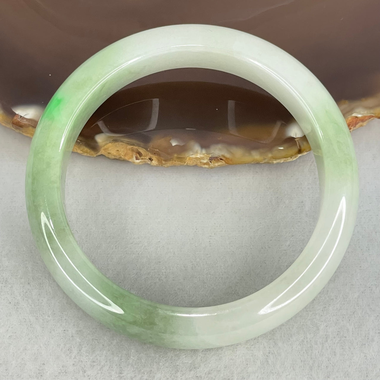 Type A Light Green with Green Patches Jadeite Bangle Internal Diameter 53.8mm 50.57g 12.3 by 7.9mm (Internal Lines)