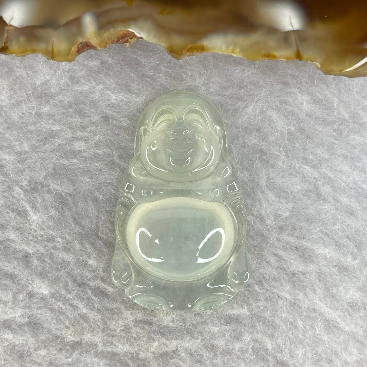 Type A Icy Faint Green Jadeite Milo Buddha 5.15g 29.8 by 19.1 by 6.7 mm - Huangs Jadeite and Jewelry Pte Ltd