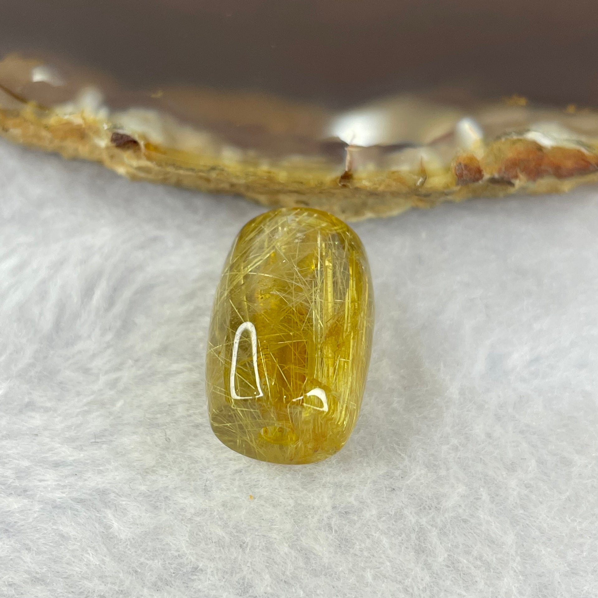 Good Grade Natural Golden Rutilated Quartz Crystal Lulu Tong Barrel 天然金顺发晶水晶露露通桶 
4.69g 17.4 by 12.5mm - Huangs Jadeite and Jewelry Pte Ltd