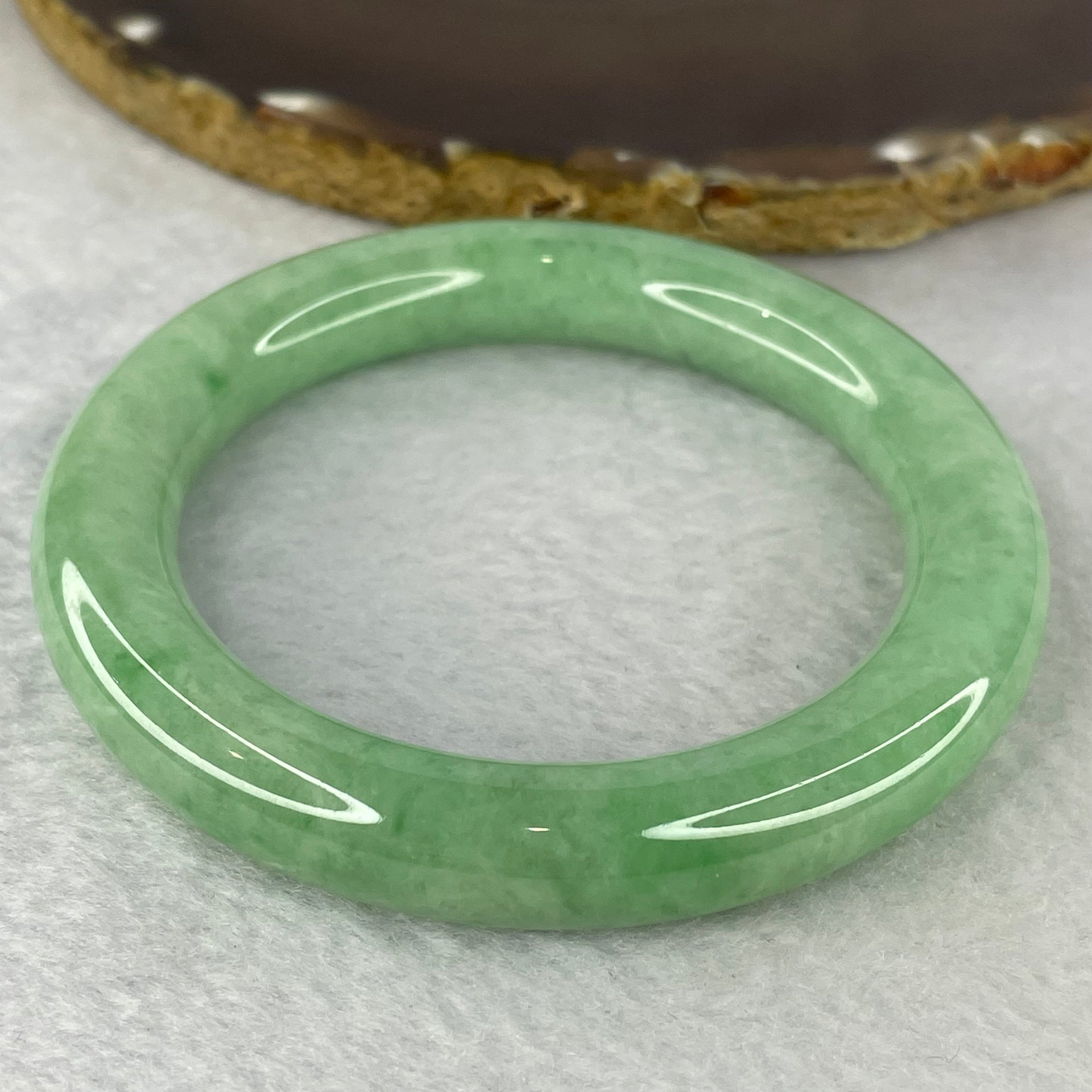 Rare High End Type A Translucent Full Intense Apple Green Jadeite Bangle 罕见高端 A 货全浓苹果绿翡翠手镯 365.01 cts 73.00g Inner diameter 58.15mm External Diameter 80.70mm 11.2 by 11.3mm (Close to Perfect) with NGI Cert No. 16813547 - Huangs Jadeite and Jewelry Pte Ltd