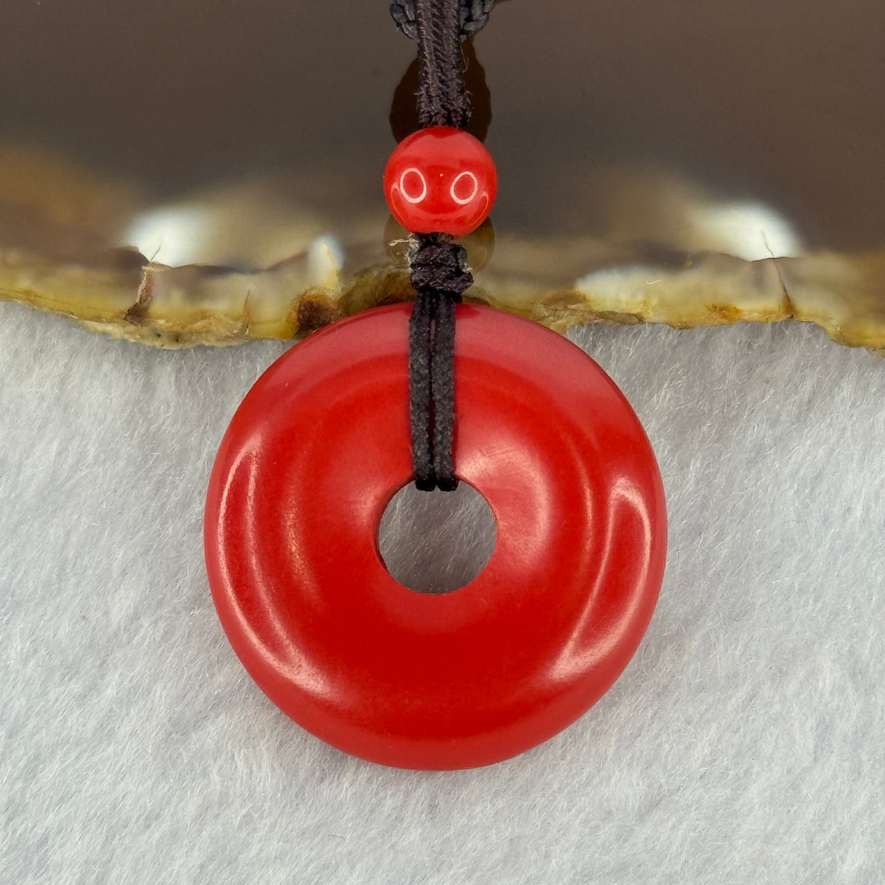 Natural Red Cinnabar Ping An Kou Donut Pendent 11.04g 25.4 by 6.5mm