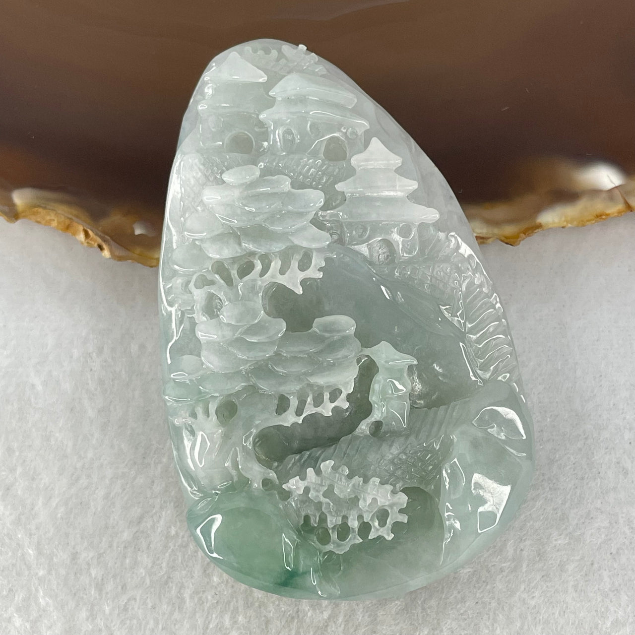 Type A Sky Blue Jadeite Double Sided Shan Shui with Gui Ren Benefactor Pendant 66.55g 67.8 by 43.2 by 13.9mm