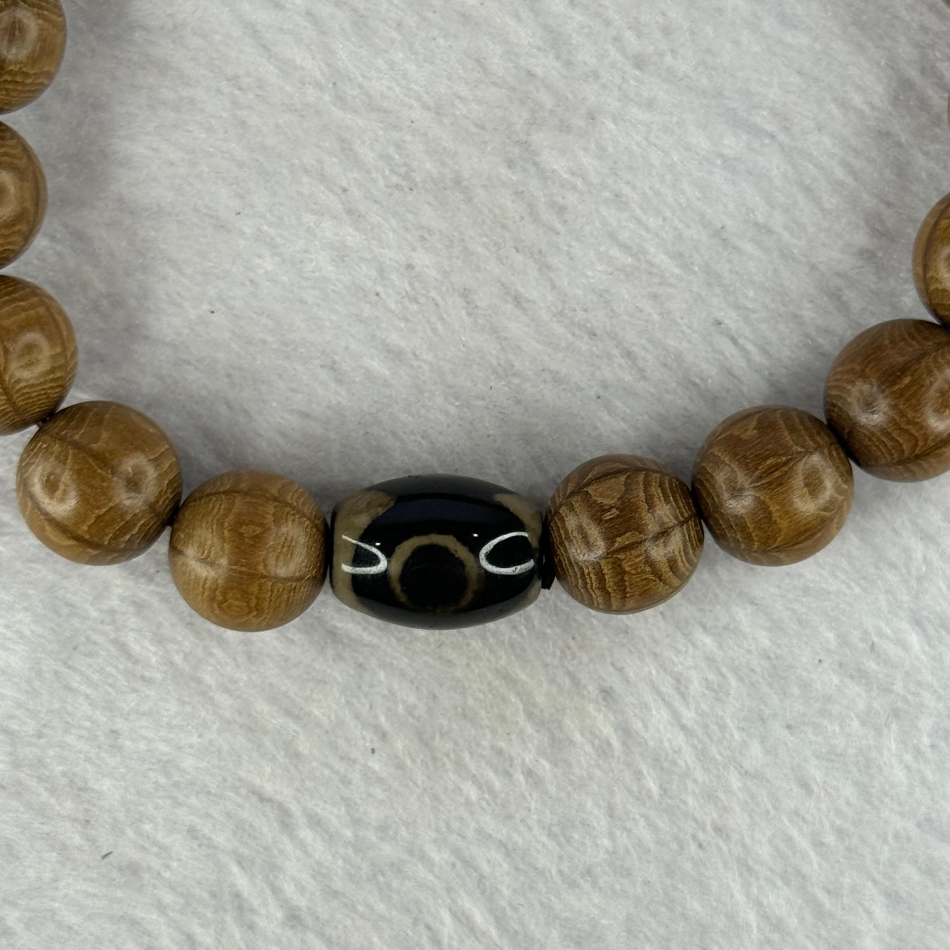 Natural Six Way Wooden Bead With 3 Eyes Dzi Bead Tian Zhu Beads Bracelets 天然六道木带三眼天珠手链 11.37g 16.5cm 10.4mm 18 Beads/ 13.5 by 10.1mm 1 Bead - Huangs Jadeite and Jewelry Pte Ltd