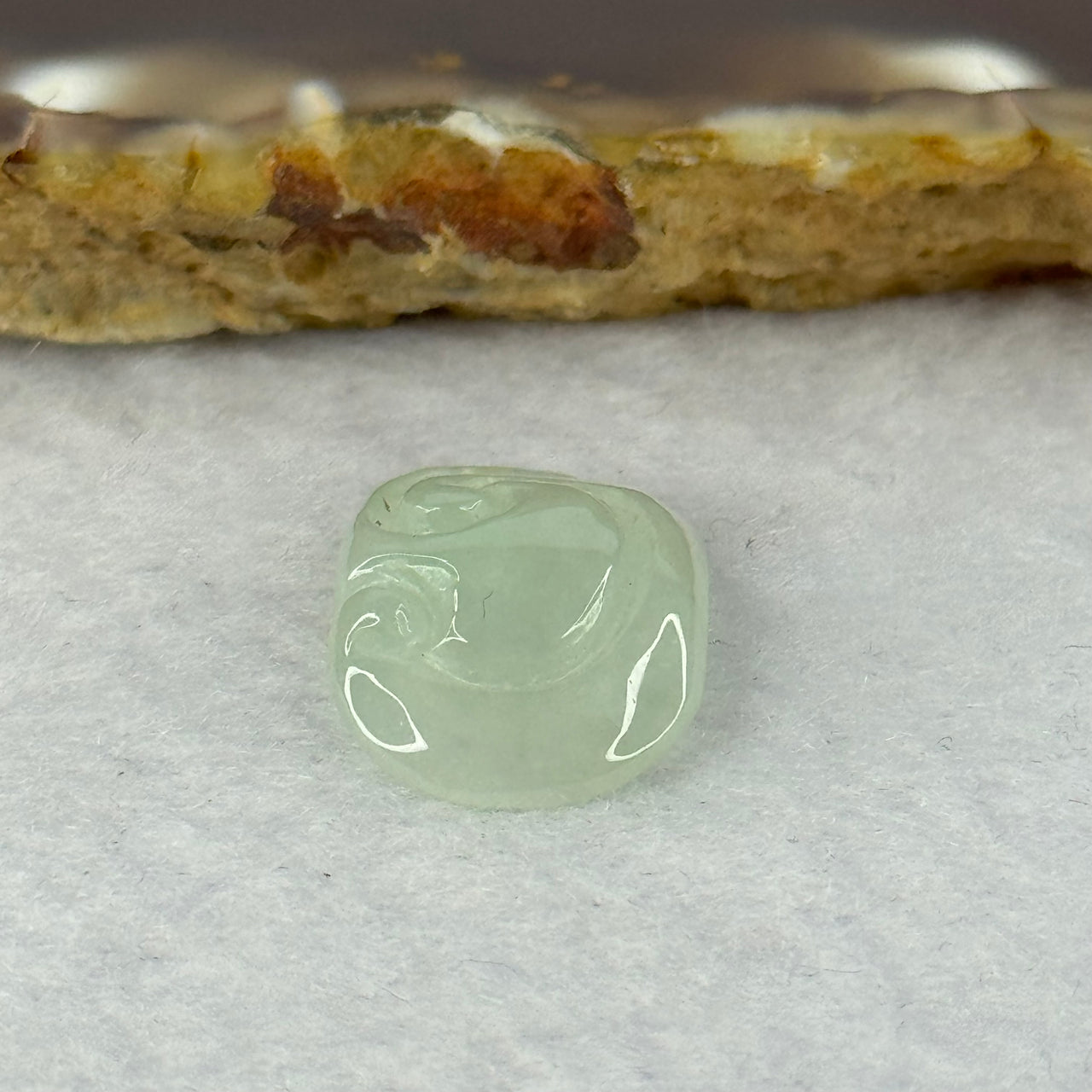 Type A Semi Icy Light Green Jadeite Mini Ruyi Pendant 2.10g 19.2 by 12.9 by 5.3mm - Huangs Jadeite and Jewelry Pte Ltd