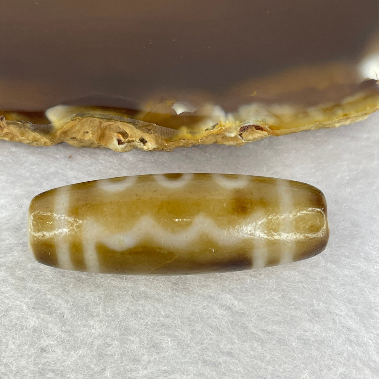 Natural Powerful Tibetan Agate 5 Eyes Dzi Bead Heavenly Master (Tian Zhu) 五眼天诛  9.74g 37.4 by 13.0 mm - Huangs Jadeite and Jewelry Pte Ltd