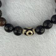 Natural Agarwood With 3 Eyes Dzi Bead Tian Zhu Beads Bracelet 天然沉香带三眼天珠手链 17.56g 16.5cm Dzi 14.4 by 9.8 and 14.1mm 1 Bead and 10.8mm 16 Beads - Huangs Jadeite and Jewelry Pte Ltd