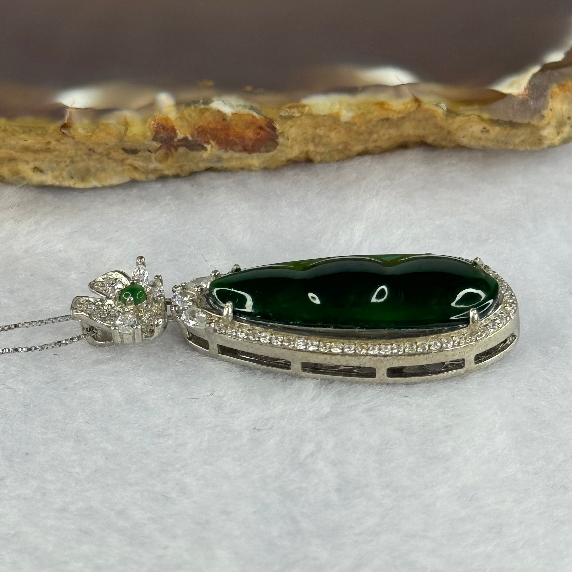 Type A ICY Jelly Omphasite Dark Green Jadeite Pea pod with Crystals in S925 Sliver Necklace 6.90g 27.3 by 10.3 by 2.5mm - Huangs Jadeite and Jewelry Pte Ltd