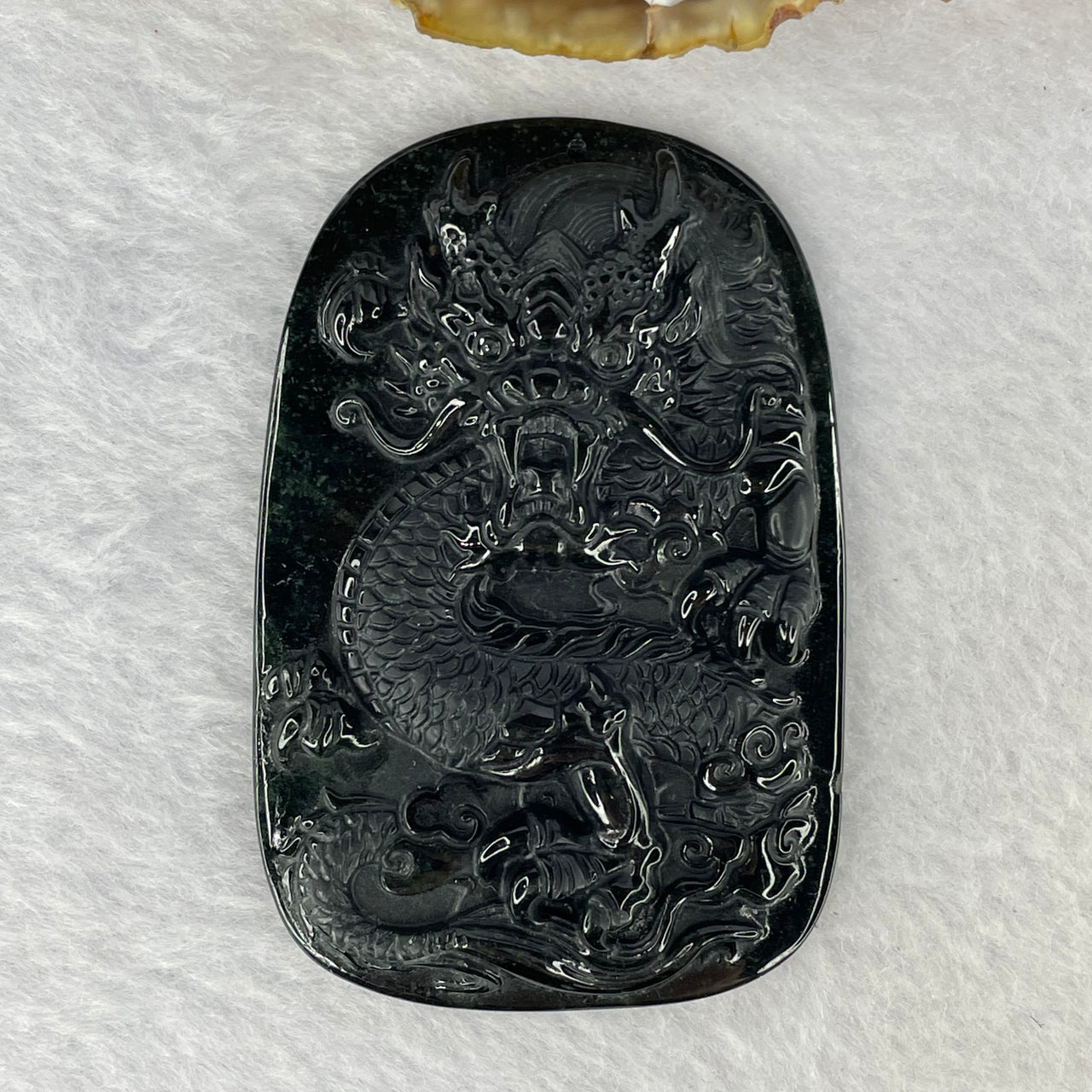 Type A Partial Translucent Black Omphasite Dragon Jadeite Pendent A货墨翠龙牌 31.69g 67.1 by 44.5 by 7.1 mm - Huangs Jadeite and Jewelry Pte Ltd