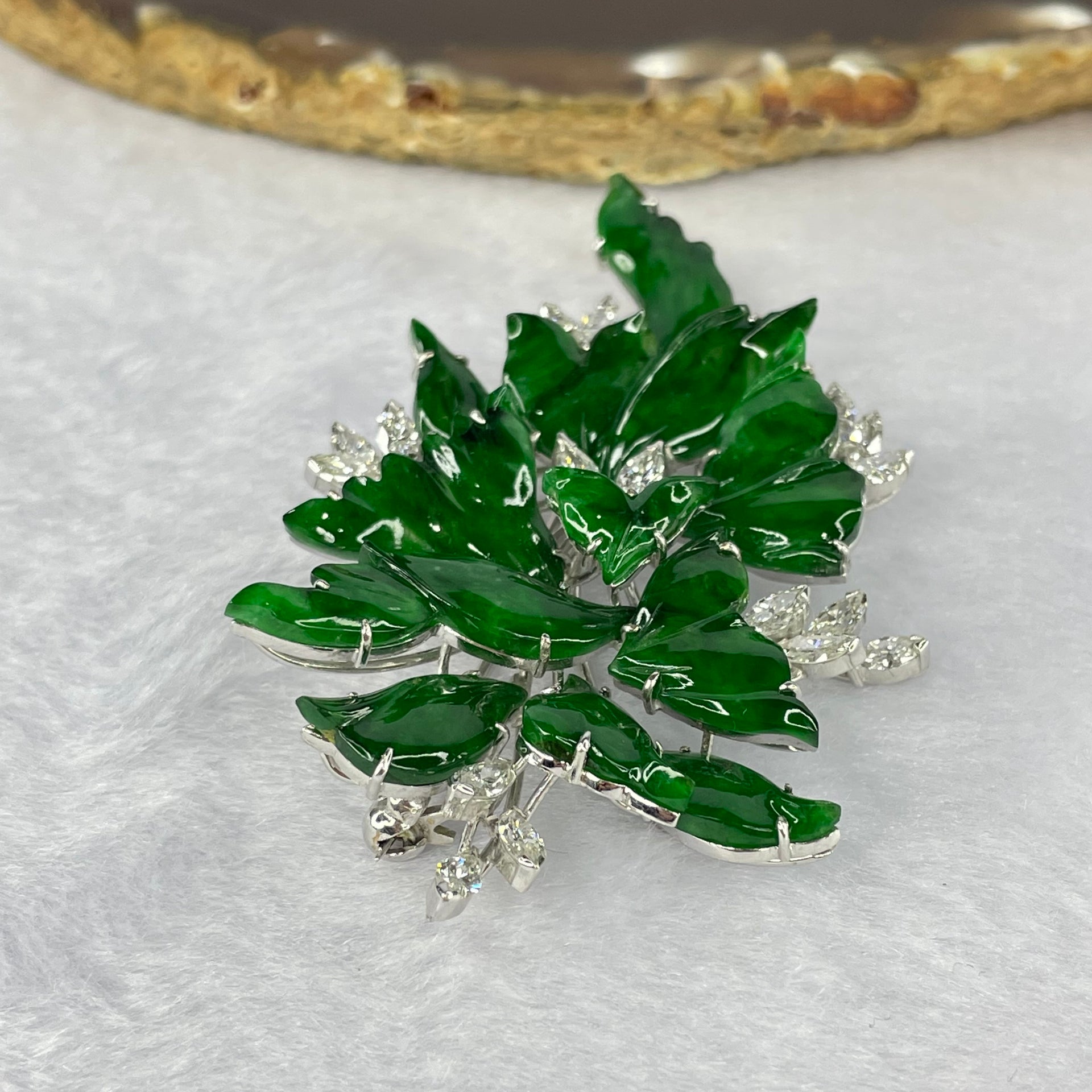 Very Very High Quality Translucent Natural Green Jadeite (TYPE A) Brooch Approx. 11.27 by 7.75 to 21.87 by 15.25mm Total Weight 22.79g including Natural Diamonds and 14K White Gold Setting with NGI Cert No.82835783 - Huangs Jadeite and Jewelry Pte Ltd