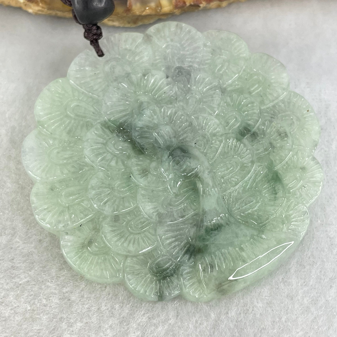 Type A Light Green with Blueish Green Piao Hua Jadeite Peacock Pendant 32.05g 52.1 by 53.0 by 5.5mm