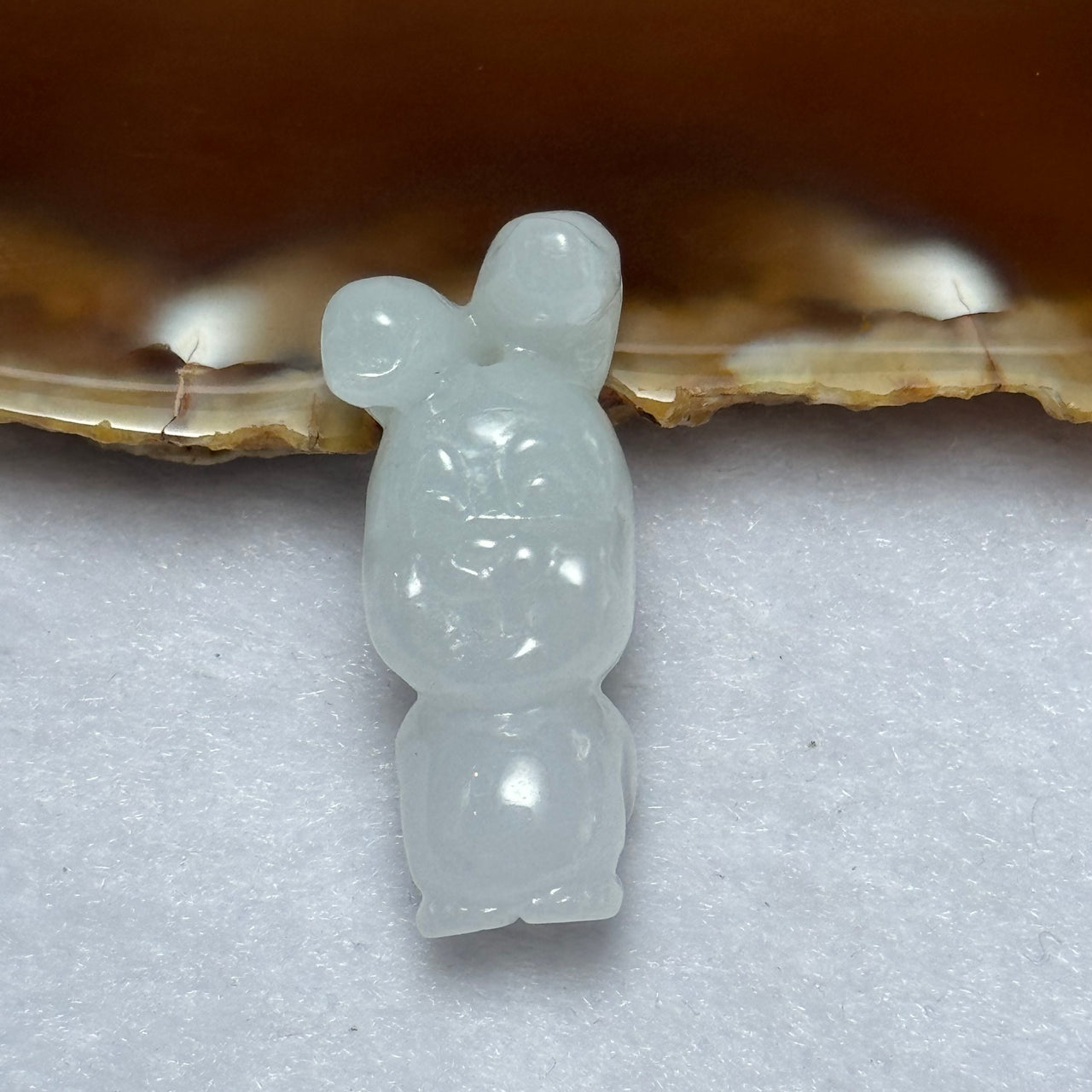 Type A Faint Lavender Green Jadeite Rabbit Pendant 8.33g 30.3 by 12.2 by 11.9mm - Huangs Jadeite and Jewelry Pte Ltd