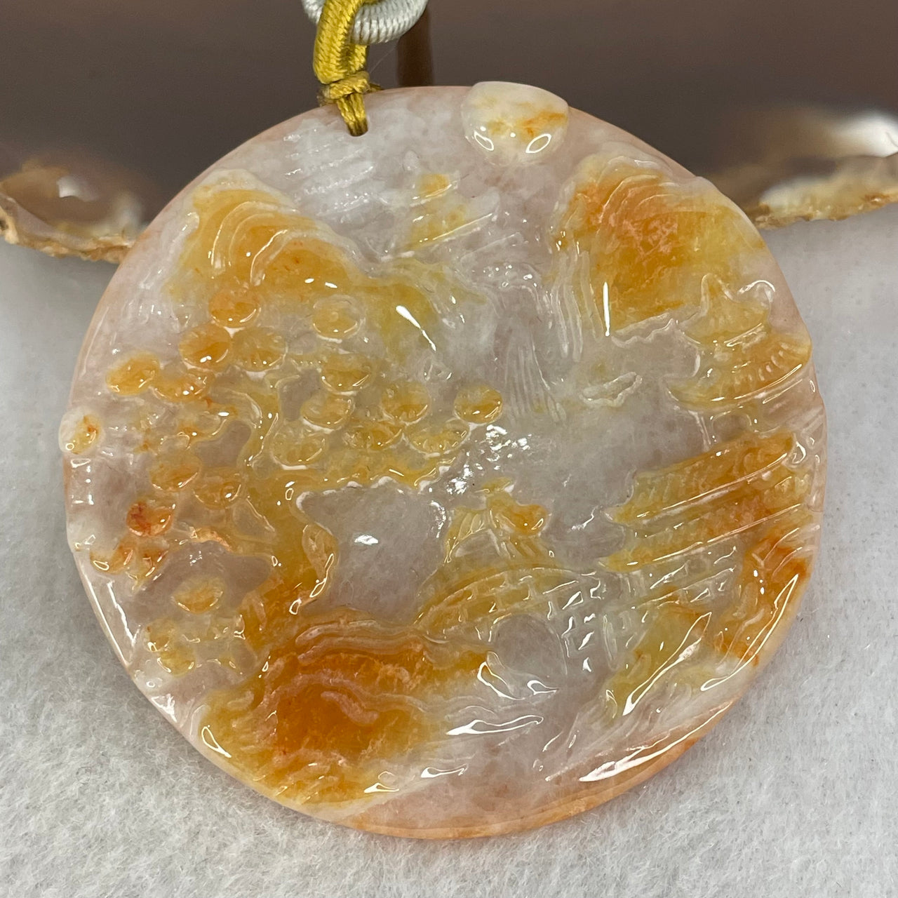 Type A Faint Lavender and Reddish Brown Jadeite Shan Shui with Gui Ren Benefactor Pendant Pendant 32.47g 51.6 by 5.6mm