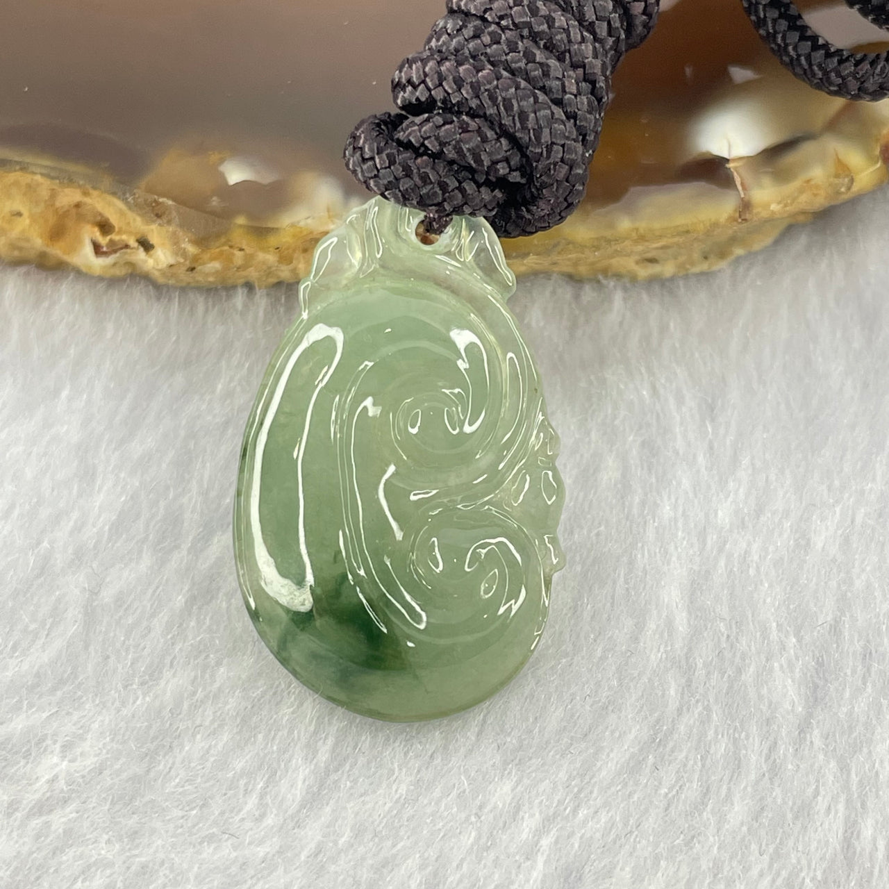 Type A Semi Icy Green with Blueish Green Patch Jadeite Ruyi Pendent 4.89g 27.1 by 16.8 by 4.5mm