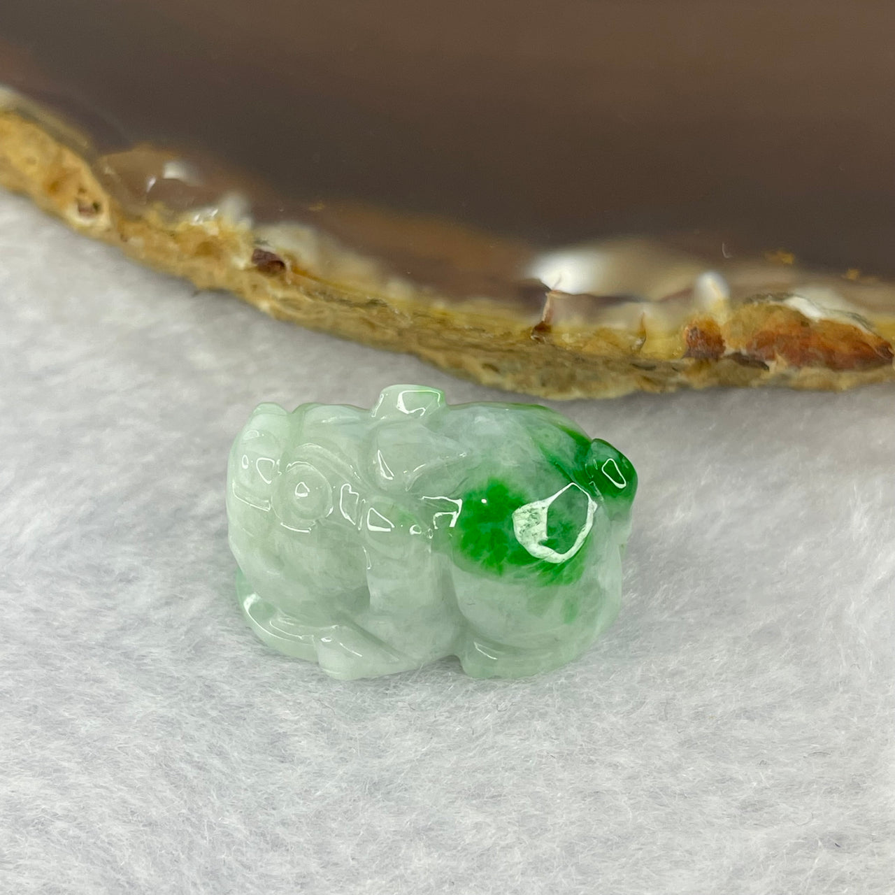 Type A Bright Green with Faint Lavender Jadeite Pixiu Pendent A货辣绿和浅紫罗兰翡翠貔貅吊坠 9.63g 23.5 by 14.6 by 13.3 mm - Huangs Jadeite and Jewelry Pte Ltd