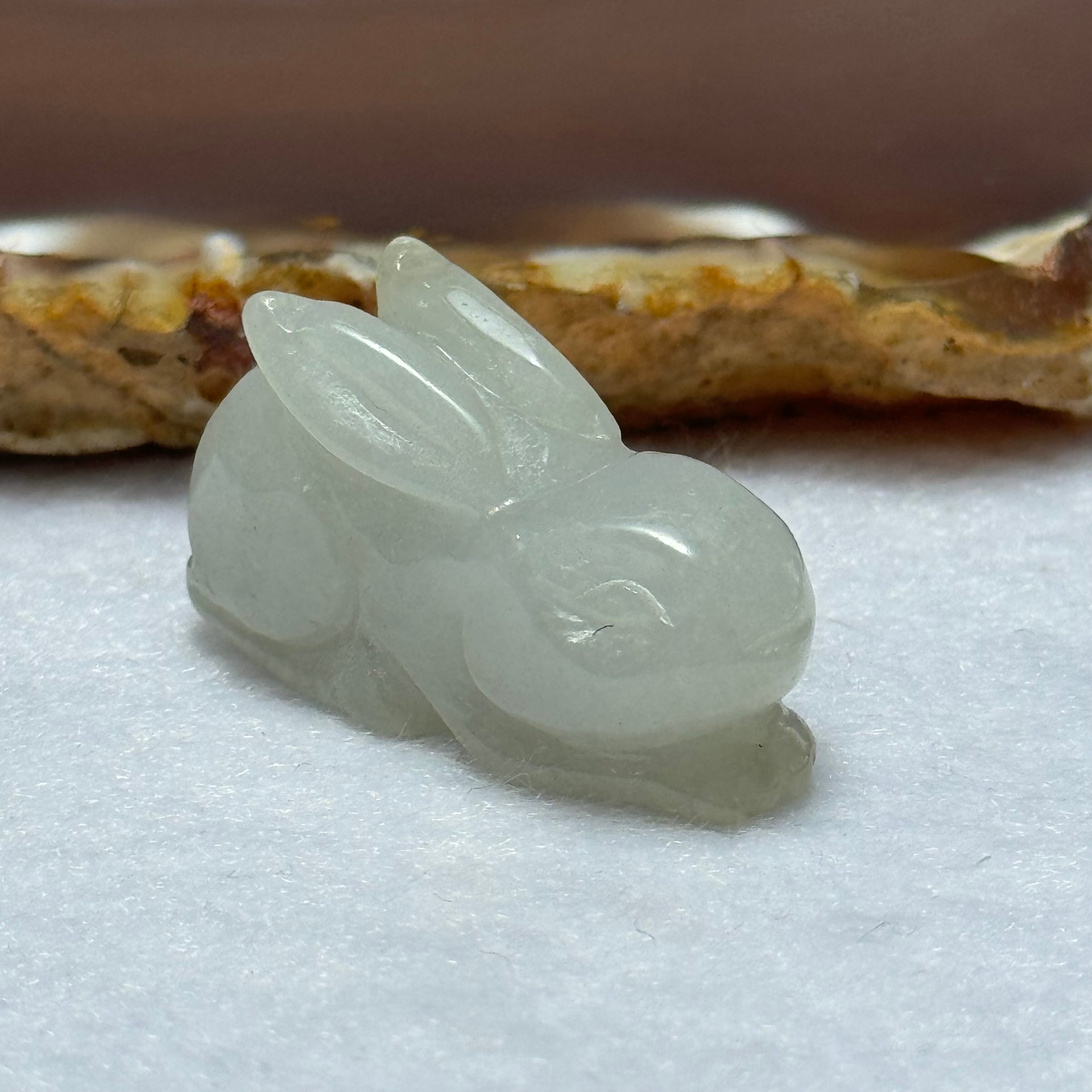 Type A Light Lavender Green Jadeite Rabbit Pendant 13.12g 31.6 by 12.8 by 17.8mm - Huangs Jadeite and Jewelry Pte Ltd