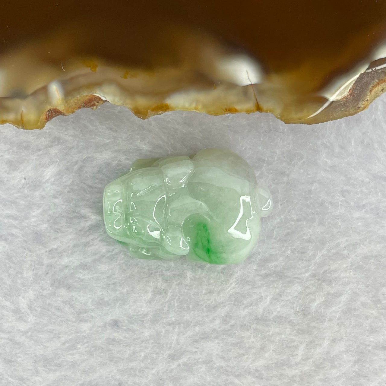 Type A Bright Green with Faint Lavender Jadeite Pixiu Pendent A货辣绿和浅紫罗兰翡翠貔貅吊坠 8.32g 22.8 by 16.2 by 12.0 mm - Huangs Jadeite and Jewelry Pte Ltd