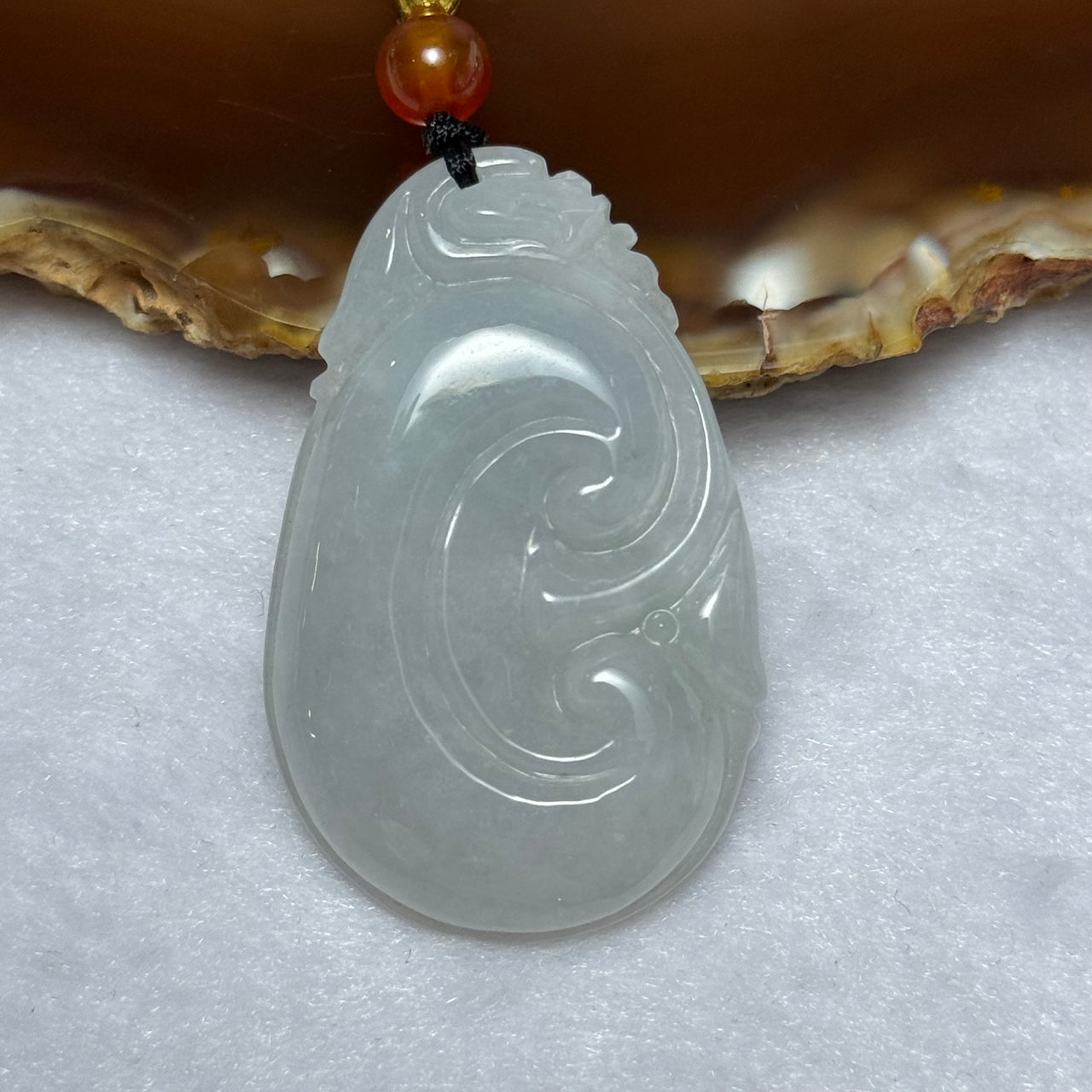 Type A Light Lavender Jadeite Ruyi Pendent 16.17g 42.2 by 26.8 by 6.8mm - Huangs Jadeite and Jewelry Pte Ltd