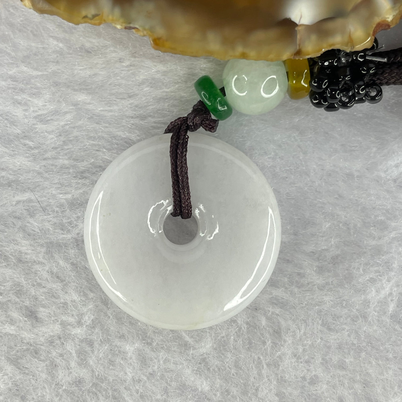 Type A Faint Lavender with slight Yellow Jadeite Ping An Kou Donut 9.47g 23.8 by 4.7 mm - Huangs Jadeite and Jewelry Pte Ltd