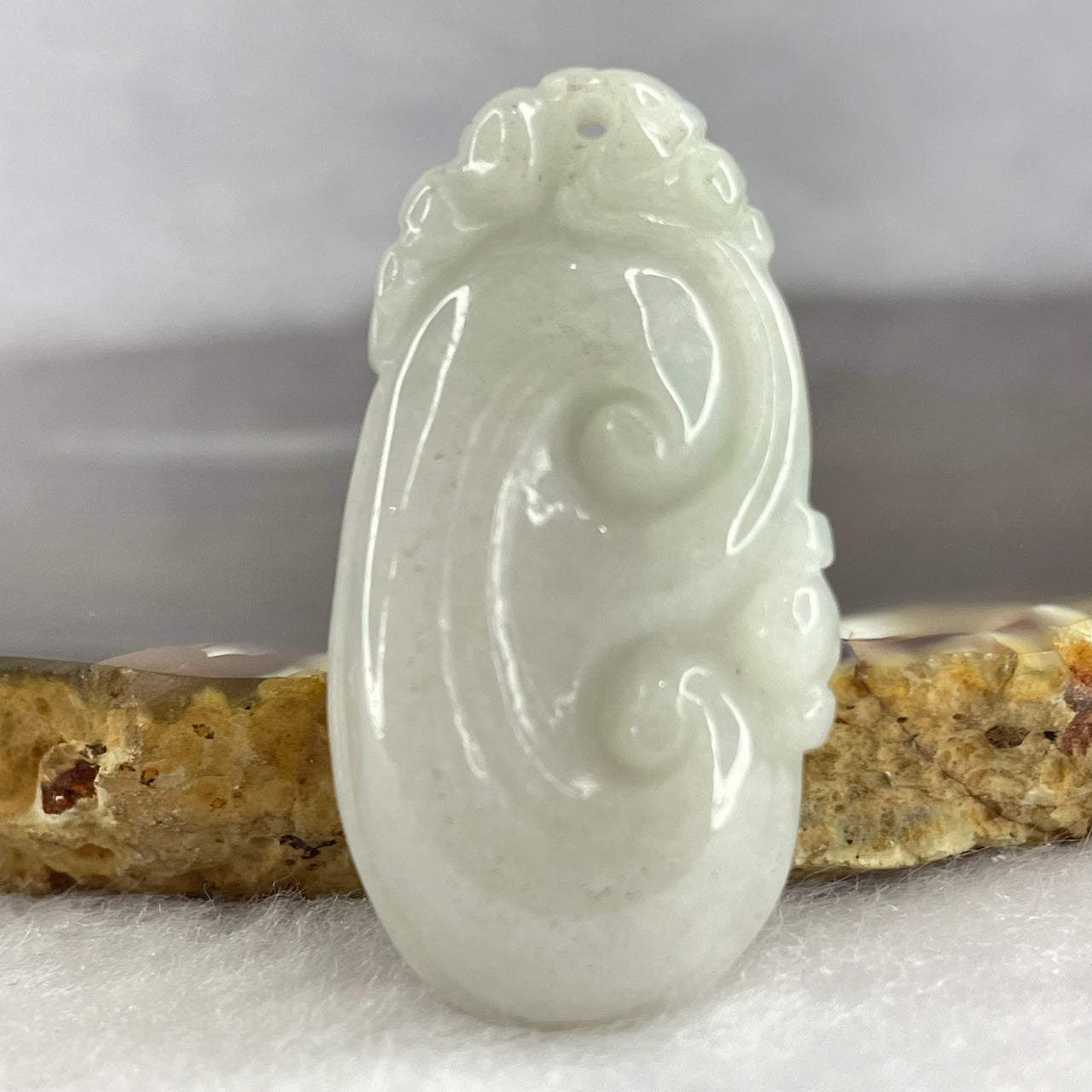 Type A Jelly Green with Faint Green Jadeite Ruyi 如意 44.50g 37.4 by 19.7 by 6.5mm - Huangs Jadeite and Jewelry Pte Ltd