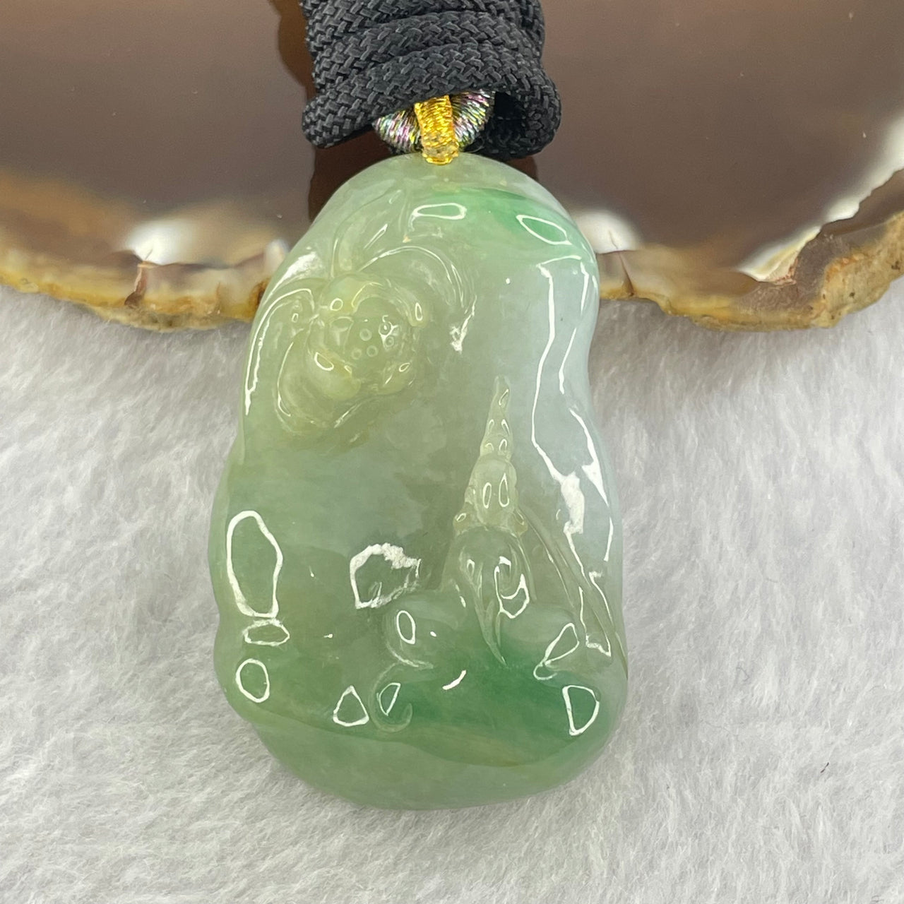 Type A Green and Lavender Jadeite Benefactor and Flower Pendant 34.80g 46.9 by 28.7 by 13.4mm