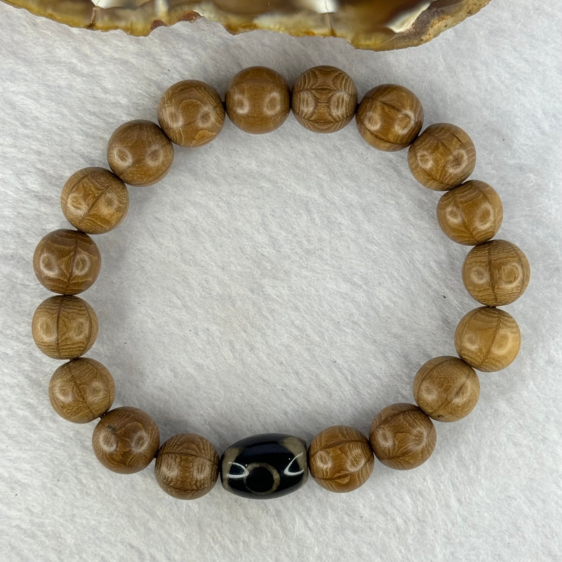 Natural Six Way Wooden Bead With 3 Eyes Dzi Bead Tian Zhu Beads Bracelets 天然六道木带三眼天珠手链 11.42g 16.5cm 10.5mm 18 Beads / 13.6 by 10.2mm 1 Bead - Huangs Jadeite and Jewelry Pte Ltd