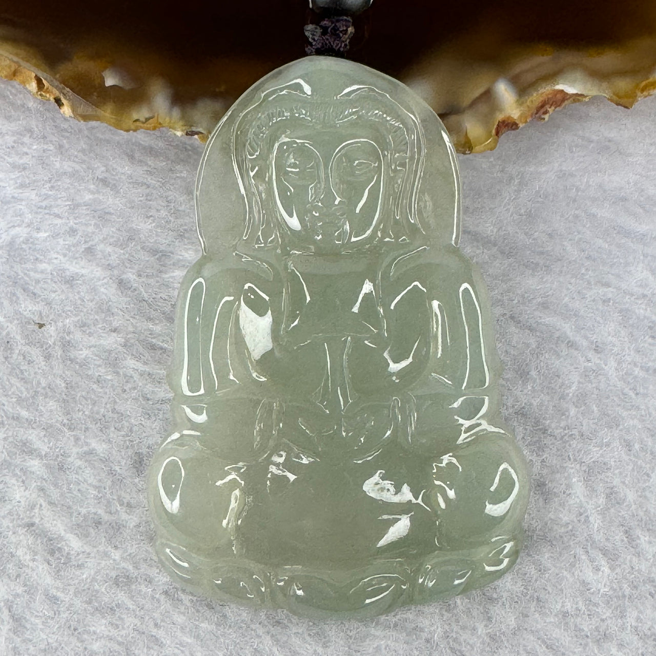 Type A Icy Green Jadeite Guan Yin Pendent 16.22g 49.0 by 33.7 by 4.5mm - Huangs Jadeite and Jewelry Pte Ltd