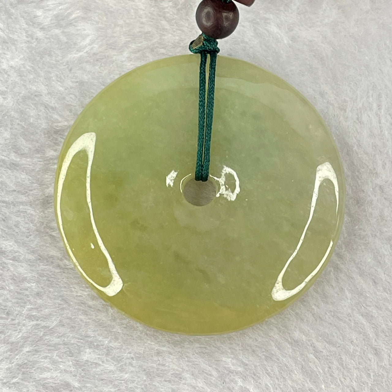 Type A Yellowish Green Jadeite Ping An Kou Donut Pendent 24.41g 43.0 by 7.1mm