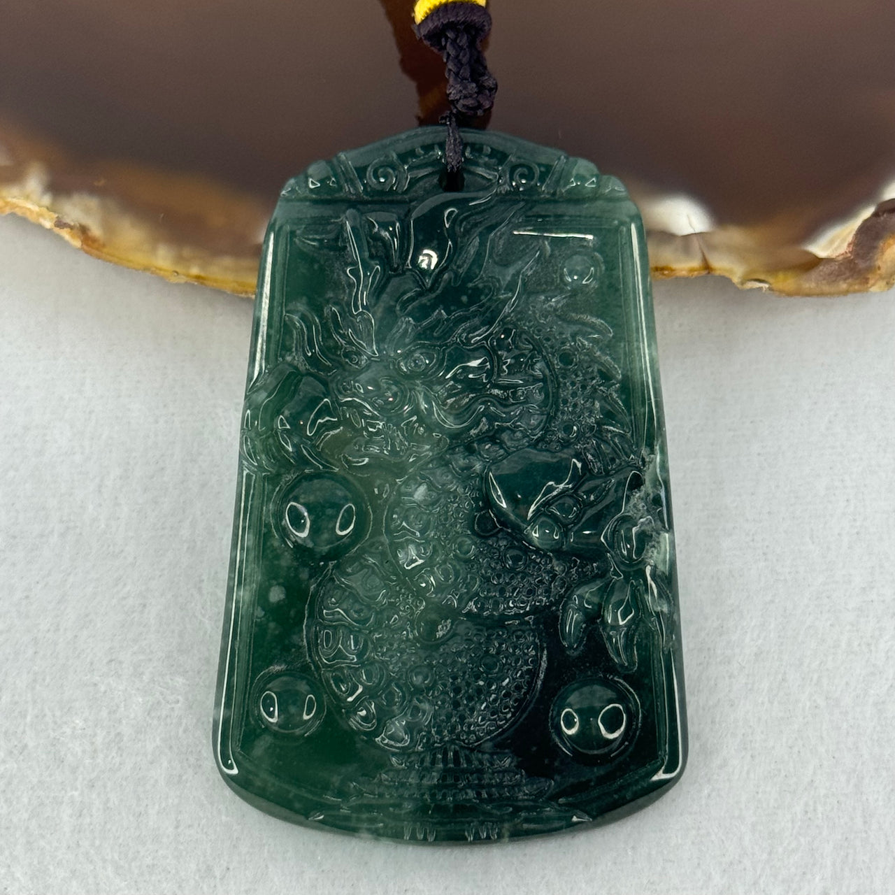 Type A Semi Icy Dark Blueish Green Jadeite Dragon Pendant 20.47g 58.7 by 37.8 by 5.3mm