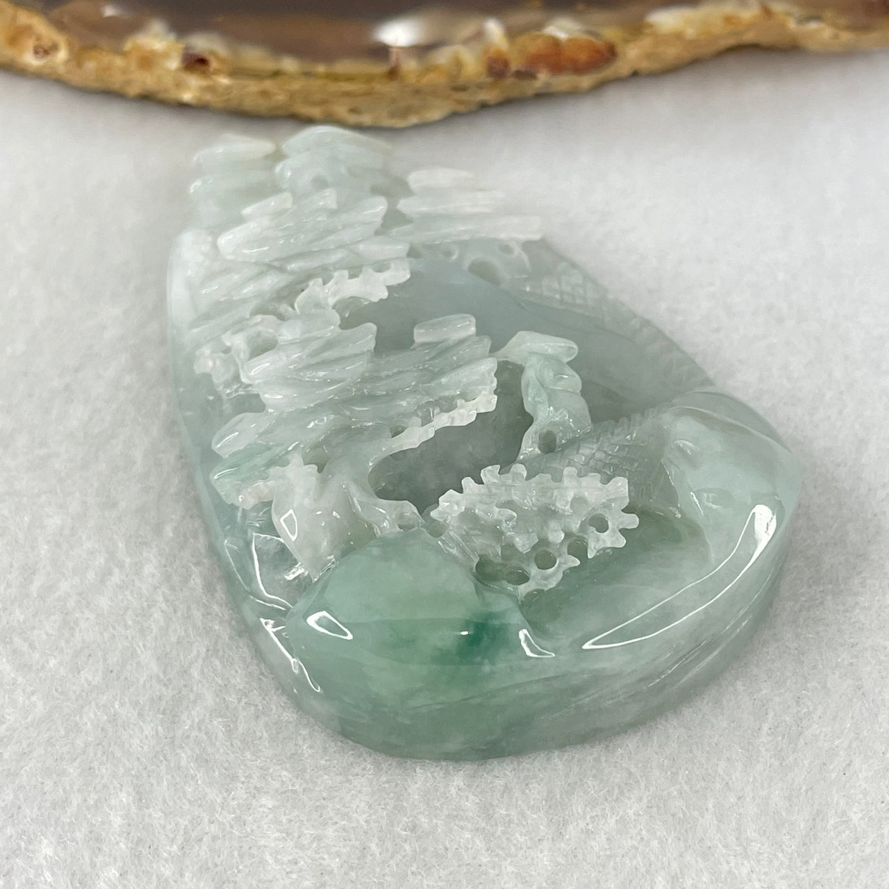 Type A Sky Blue Jadeite Double Sided Shan Shui with Gui Ren Benefactor Pendant 66.55g 67.8 by 43.2 by 13.9mm