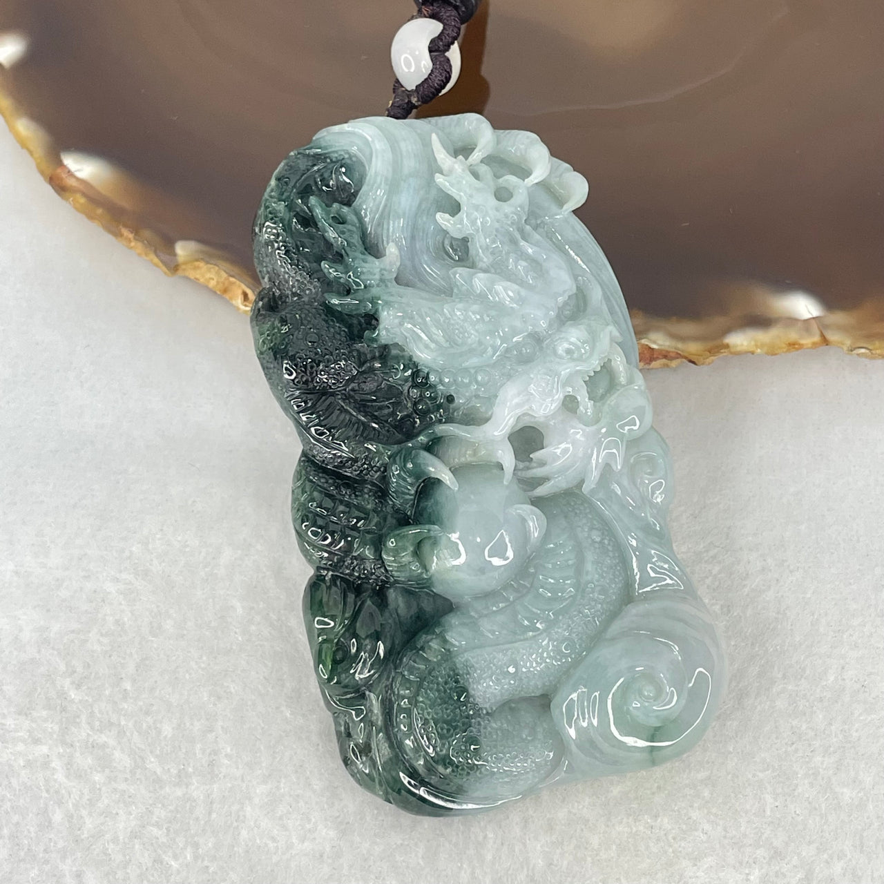 Type A Light Green Light Lavender and Dark Green Jadeite Double Sided Dragon Pendant 87.12g 77.6 by 43.2 by 13.4mm