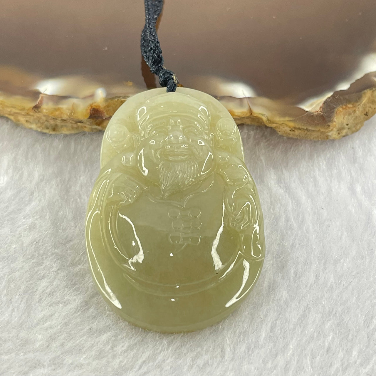 Type A Brownish Yellow Jadeite Cai Shen Ye God of Fortune Pendent 15.00g 40.8 by 27.7 by 6.8mm