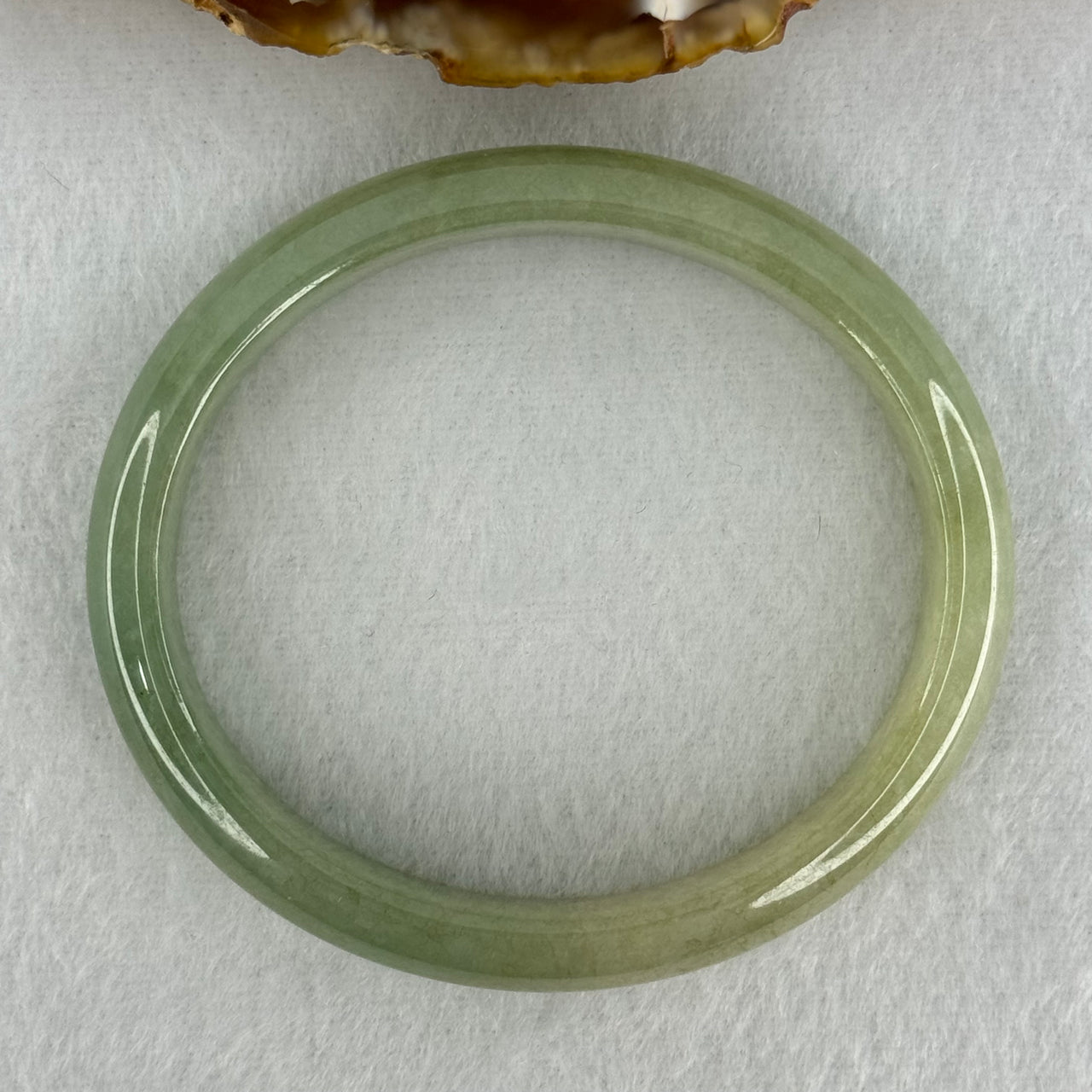 Type A Full Green Jadeite Oval Bangle Internal Diameter 55.4mm 11.9 by 6.5mm (Very Slight Fine Internal Lines)