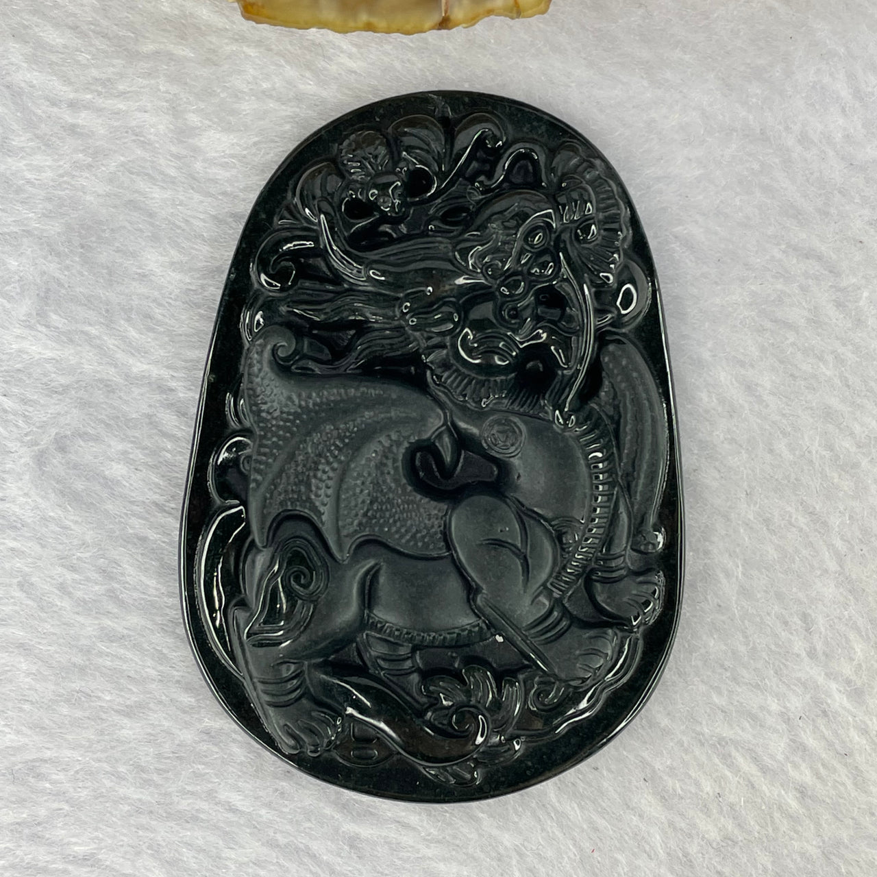 Type A Partial Translucent Black Omphasite Jadeite Flying Dragon with Bat Pendent A货墨翠飞龙蝙蝠牌 29.24g 61.3 by 44.2 by 9.3 mm - Huangs Jadeite and Jewelry Pte Ltd