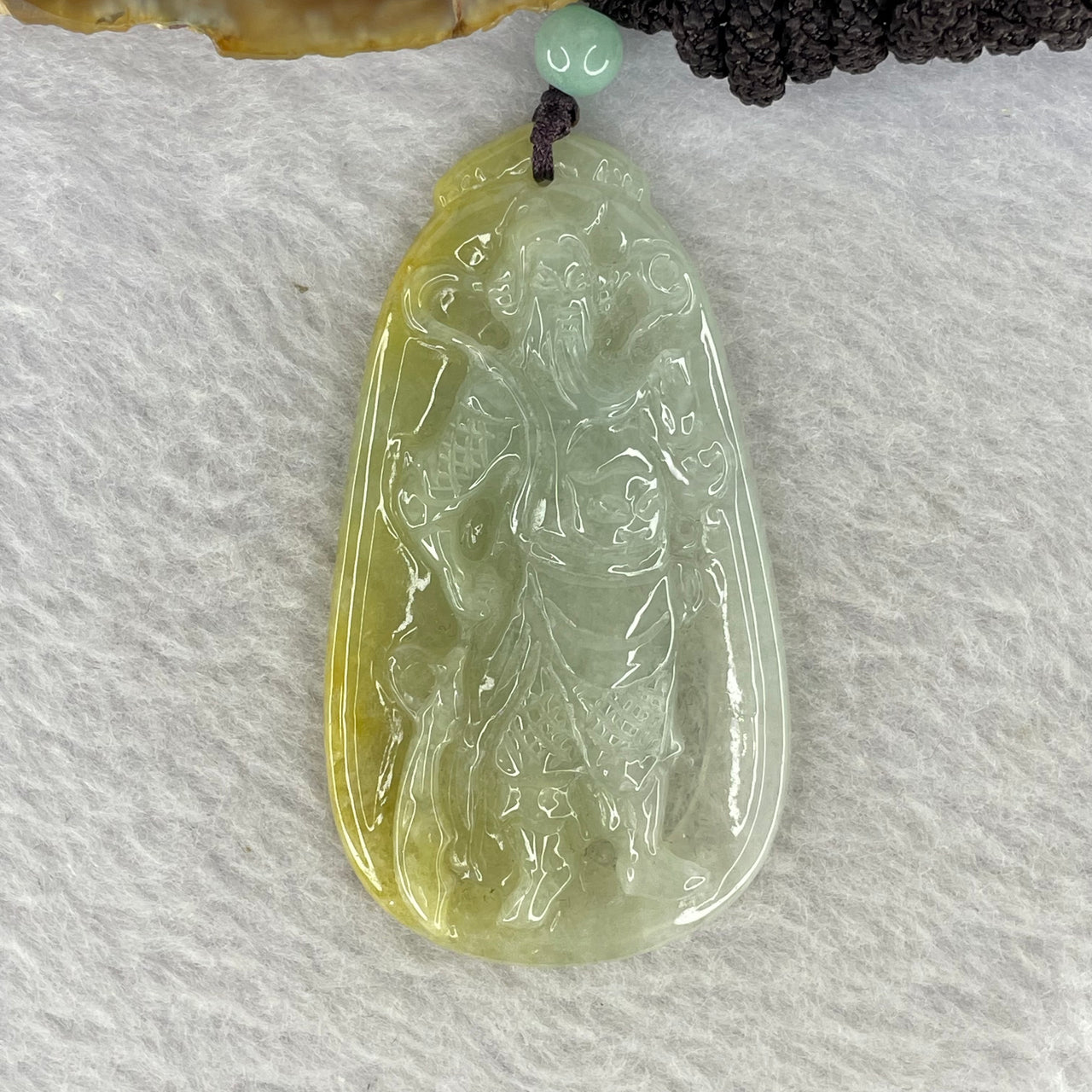 Type A Semi Icy Yellow Green and Light Lavender Jadeite Guan Gong Pendent 22.23g 61.8 by 34.3 by 7.0 mm - Huangs Jadeite and Jewelry Pte Ltd