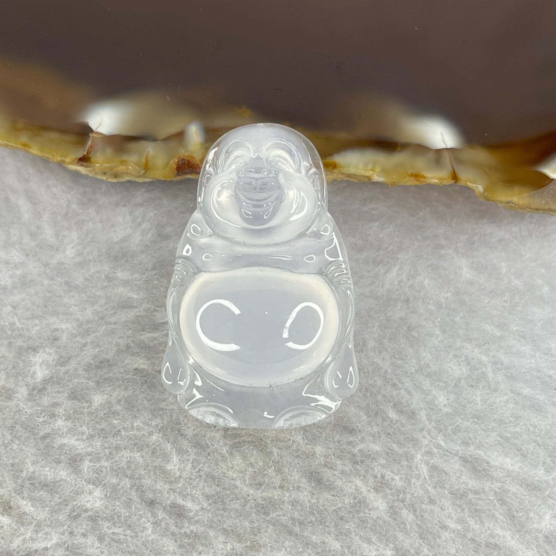 Type A Icy White Jadeite Milo Buddha 5.57g 29.7 by 19.2 by 7.2 mm - Huangs Jadeite and Jewelry Pte Ltd