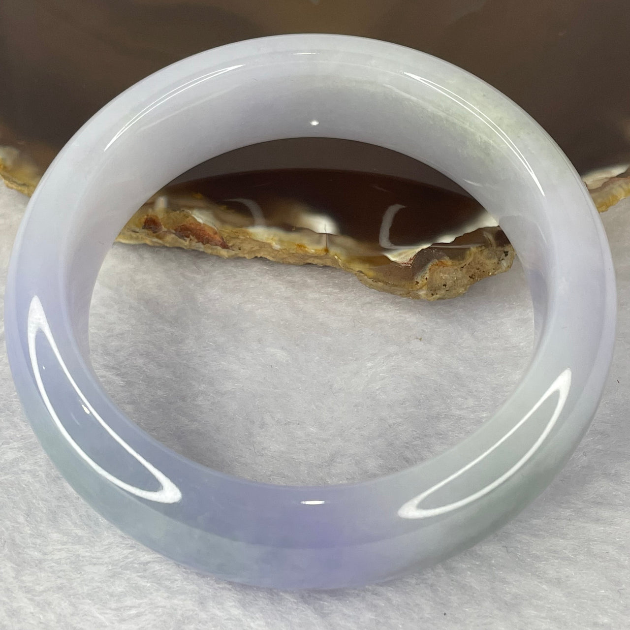 Type A faint lavender to lavender with faint bluish green patches Jadeite Bangle 106.65g inner diameter 60.08mm by 18.8 by 10.1mm (perfect) with NGI cert - Huangs Jadeite and Jewelry Pte Ltd