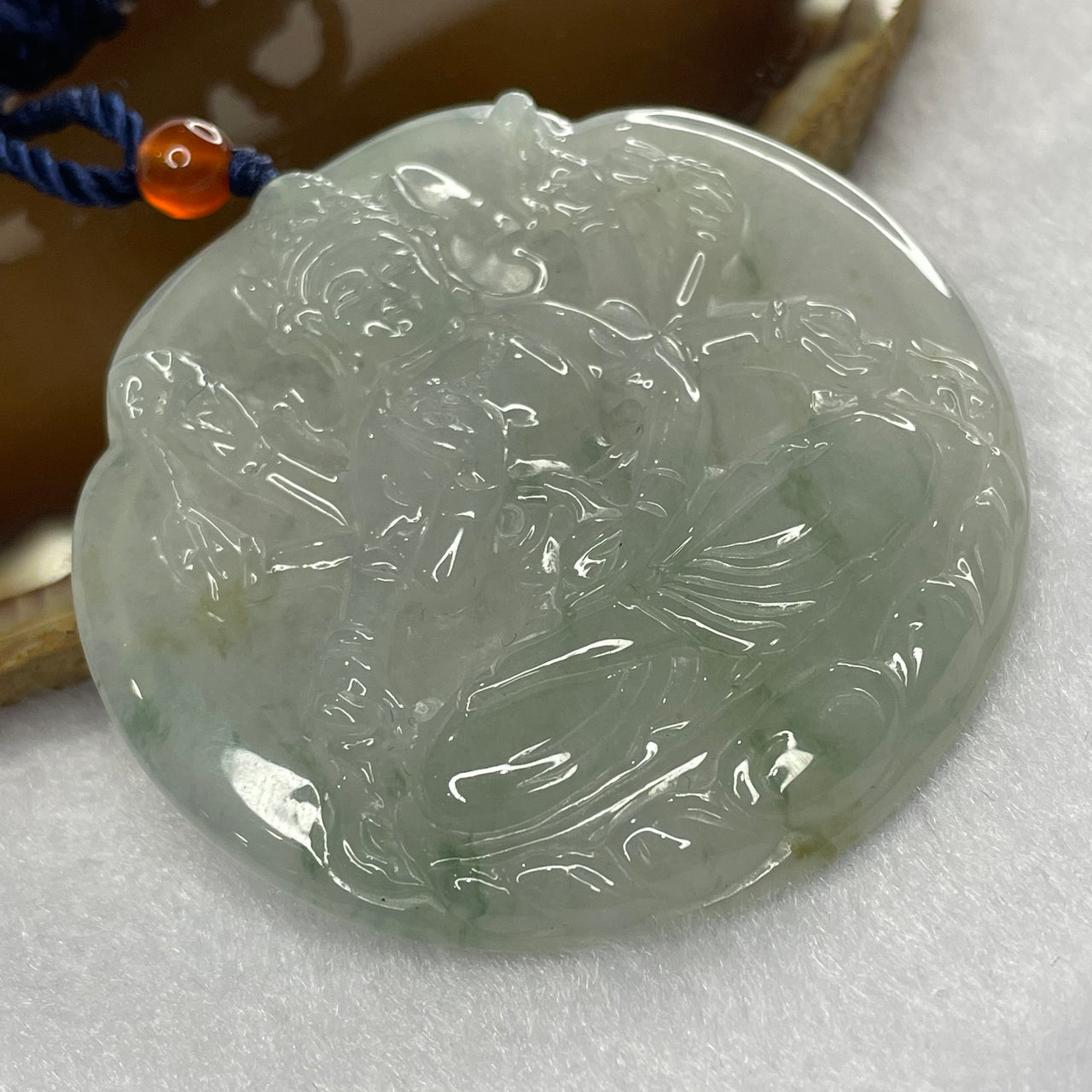 Type A Icy Green Piao Hua Jade Jadeite Thousand Hand Guan Yin Pendant - 27.70g 54.2 by 54.2 by 5.3 mm - Huangs Jadeite and Jewelry Pte Ltd