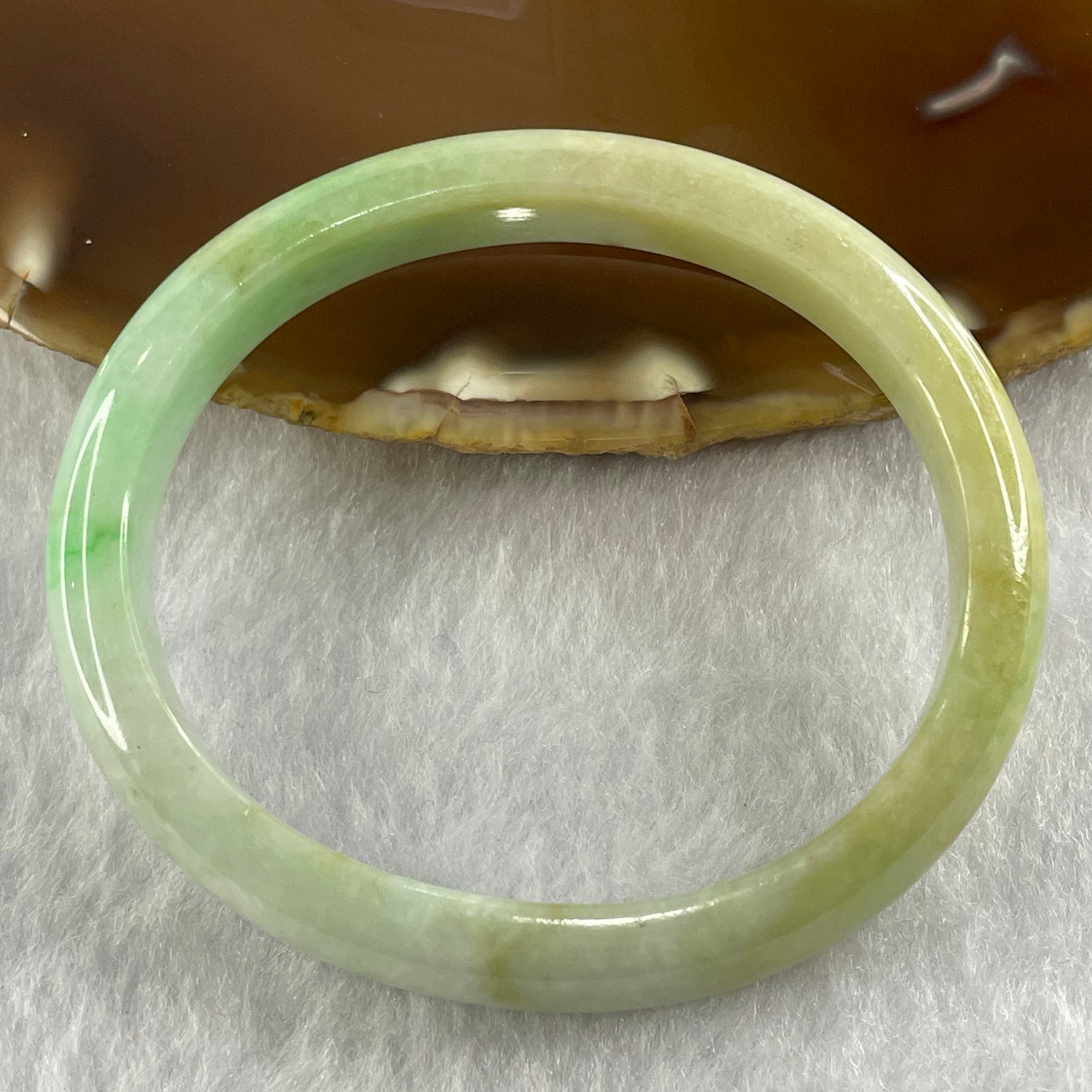 Type A Spicy Green and Yellow Jade Jadeite Oval Bangle 29.75g inner Dia 54.0mm 9.8 by 6.5mm - Huangs Jadeite and Jewelry Pte Ltd