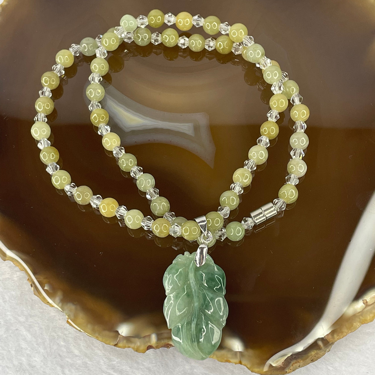 Type A Icy Green Leaf Jadeite with round crystal bead necklace 24.27g 31 by 18.9 by 3.9mm - Huangs Jadeite and Jewelry Pte Ltd