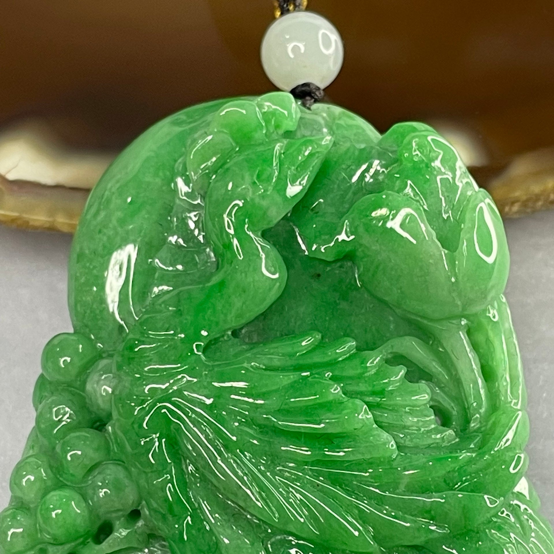 Great Grand Master Intense Apple Green Jadeite Phoenix Pendant - 51.86g 58.4 by 40.6 by 12.0 mm - Huangs Jadeite and Jewelry Pte Ltd