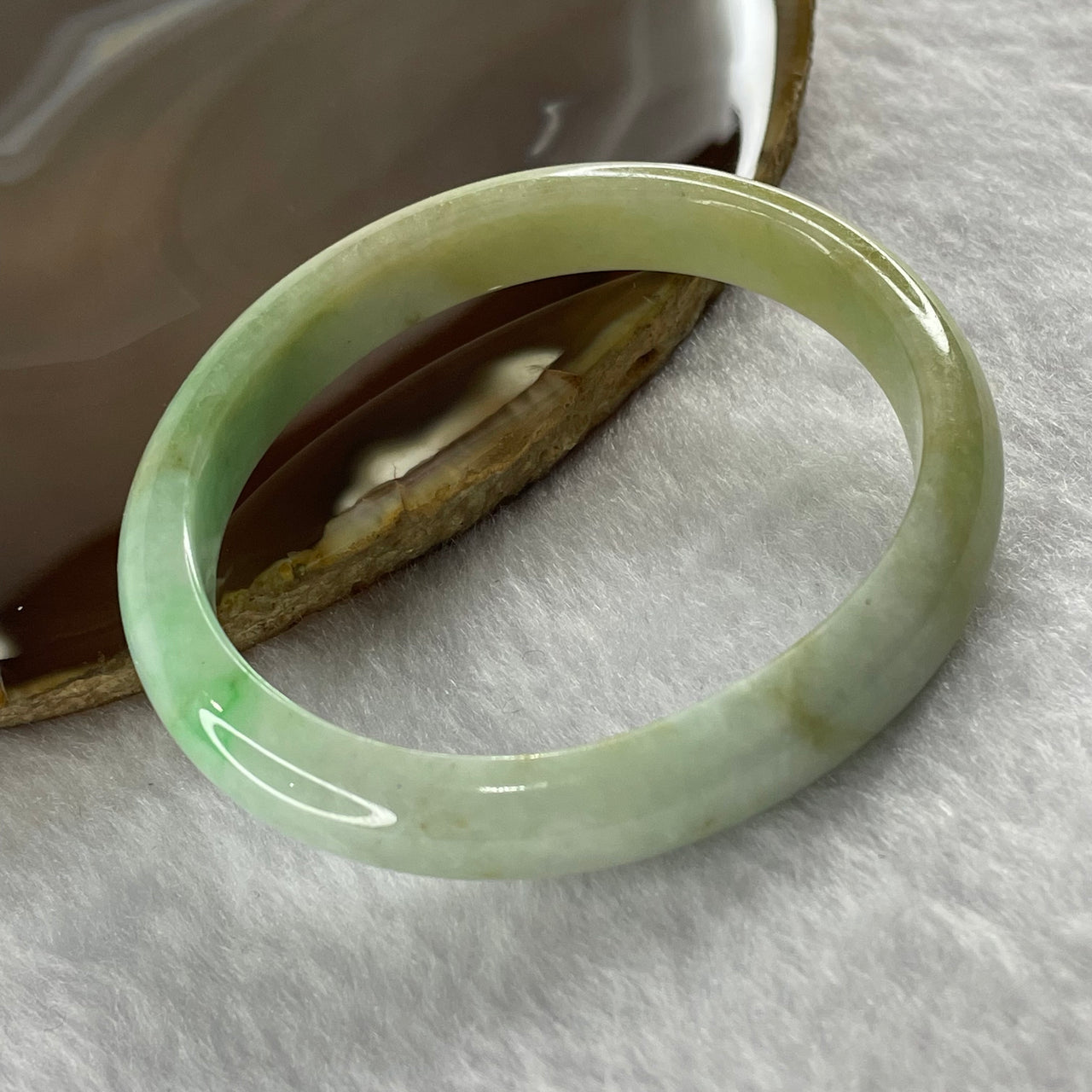 Type A Spicy Green and Yellow Jade Jadeite Oval Bangle 29.75g inner Dia 54.0mm 9.8 by 6.5mm - Huangs Jadeite and Jewelry Pte Ltd